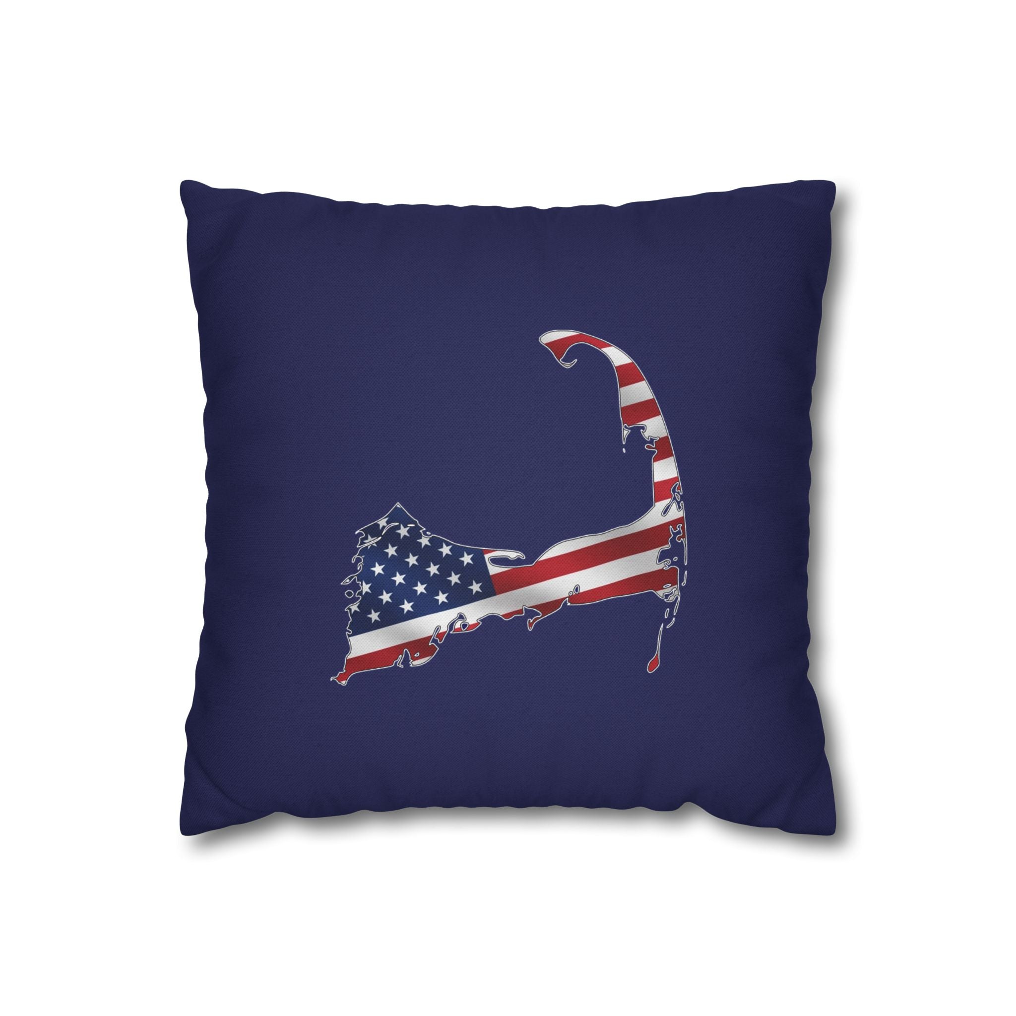 A square navy blue throw pillow featuring a printed graphic of Cape Cod's silhouette filled with an American flag pattern, set against a plain white background.